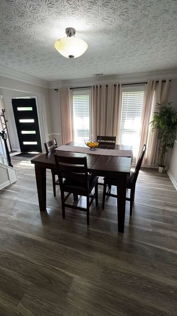 Cleaned dining room with hardwood floors
